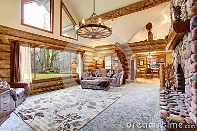 Bright Living room interior in American log cabin house. Stock Photo