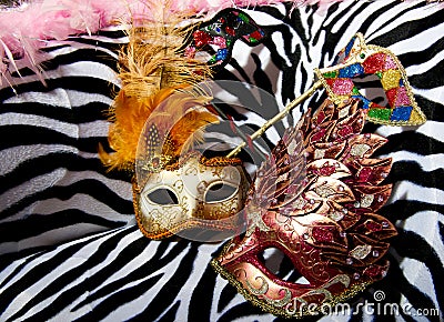 Bright masquerade masks on retro chair Stock Photo