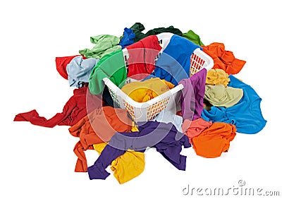 Bright messy clothes in a laundry basket Stock Photo