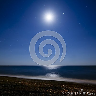 Bright moon reflected in the water Stock Photo