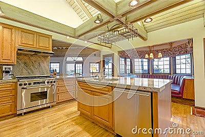 Bright, open kitchen with vaulted ceilings and wooden beams Editorial Stock Photo