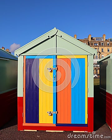 A bright painted holiday beach hut. Stock Photo