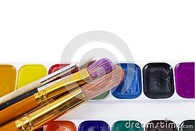 Bright paints watercolors with brushes isolated on white Stock Photo