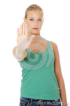 Bright picture of young woman making stop gesture. Stock Photo