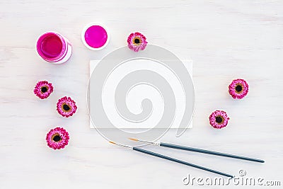 Bright pink acrylic paint and blank canvas Stock Photo