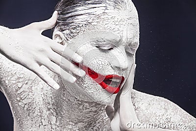 Bright portrait of girl with an unusual make-up. Horror. Halloween Stock Photo