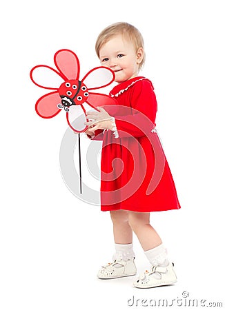 Bright portrait of playing adorable baby girl with red toy Stock Photo