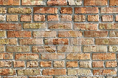 Bright pronounced texture of the old brick on the wall Stock Photo