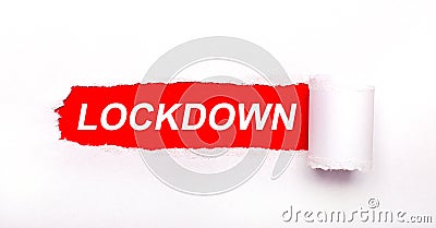 On a bright red background, white paper with a torn stripe and the inscription LOCKDOWN Stock Photo