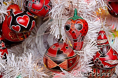 Bright red Christmas tree decorations in Southwestern style in O Stock Photo
