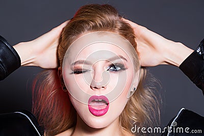 Bright red lips makeup, perfect clean skin, eye shadows. Girl beauty face closeup. lips. Skincare facial treatment Stock Photo