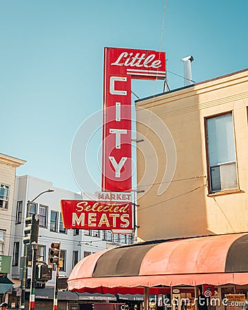 Bright red vintage Little City Market sign, in North Beach, San Francisco, California Editorial Stock Photo