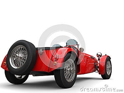 Bright red vintage open wheel sport racing car - back view Stock Photo