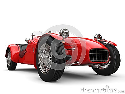 Bright red vintage open wheel sport racing car - low angle closeup shot Stock Photo
