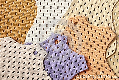 Bright samples of colorful perforated genuine leather, texture, for background Stock Photo