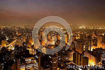 Sao Paulo metropolis at night: the bright skyline of the city of Sao Paulo, Brazil`s largest city, during the evening/night. Stock Photo