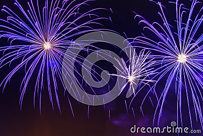 Bright sparkling fireworks dark blue on the night sky Stock Photo