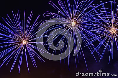 Bright sparkling fireworks dark blue on the night sky. Stock Photo
