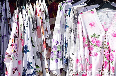 Bright summer dresses on sale rack Stock Photo