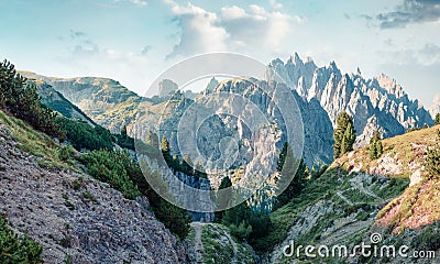 Bright summer scene of National Park Tre Cime di Lavaredo with Cadini di Misurina range on background. Picturesque morning view of Stock Photo