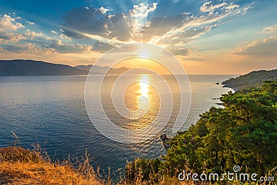 Bright sun above the sea Stock Photo