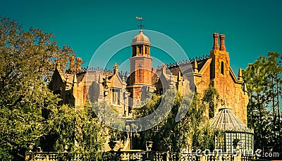 Bright Sun lit Haunted Mansion Ride at Walt Disney World Editorial Stock Photo