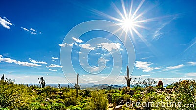 Bright Sun Rays over the Valley of the Sun with the city of Phoenix viewed from Usery Mountain Reginal Park Stock Photo