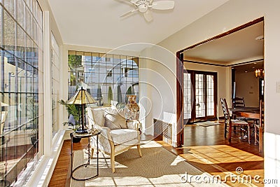 Bright sunroom with antique chair Stock Photo