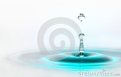 Bright turquoise blue waterdrop wallpaper Stock Photo