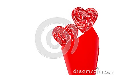 Bright wedding background - couple sweet red lollipops hearts as bouquet isolated on white background, copy space. Stock Photo