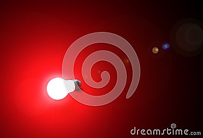 Bright white lamp on red background Stock Photo