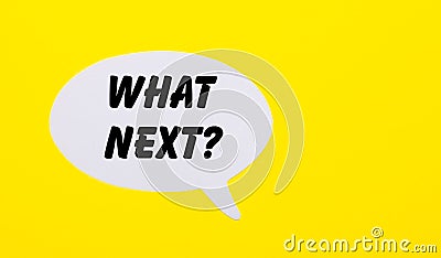 On a bright yellow background, white paper with the words Question WHAT NEXT Stock Photo