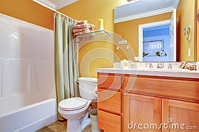 Bright yellow bathroom interior Stock Photo