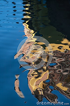 Building reflected in the water of the canal Stock Photo