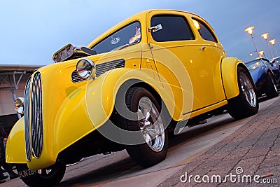 Bright yellow hot rod at the meet Editorial Stock Photo