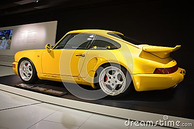 Bright yellow Porsche at the Porsche museum Editorial Stock Photo