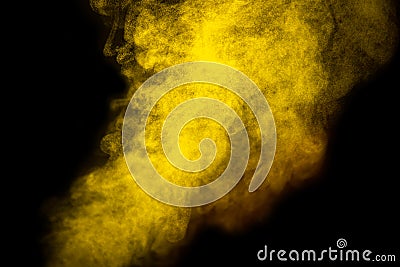 Bright yellow smoke isolated on black background is macro Stock Photo