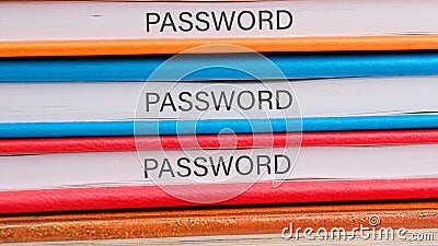 Brightly colored binders labeled with the word 'PASSWORD' are neatly stacked, emphasizing the importance of Stock Photo