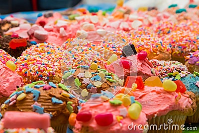 Brightly colored cupcakes at a kids party Stock Photo