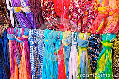 Brightly Colored Scarves on Rack Stock Photo