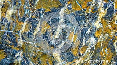 This is a brightly colored, striped stone. Stock Photo