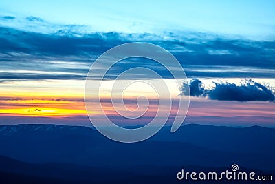 brightly colorful clouds in the evening sky. Lush colored clouds in the sky before sunset Stock Photo
