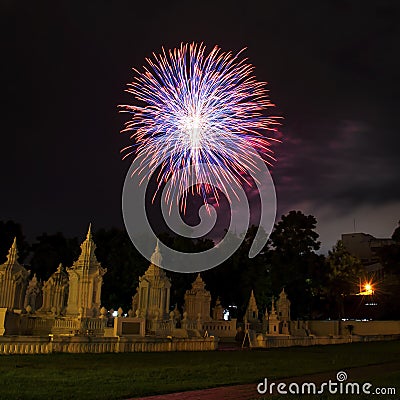 Brightly colorful fireworks colors in the night sky Stock Photo