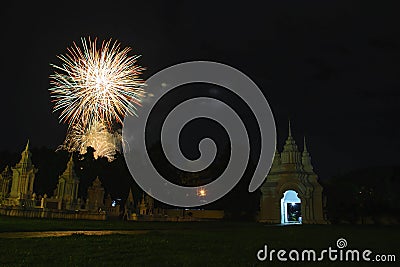 Brightly colorful fireworks colors in the night sky Stock Photo