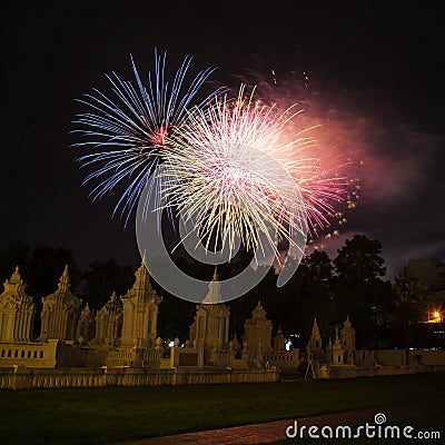 Brightly colorful fireworks colors in the night sky Stock Photo