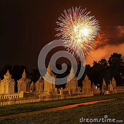 Brightly colorful fireworks colors in the night sky Stock Photo