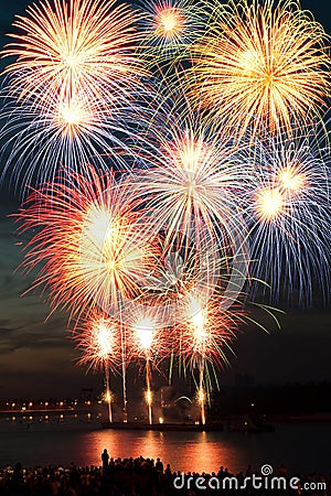 Brightly colorful fireworks in the night sky Stock Photo