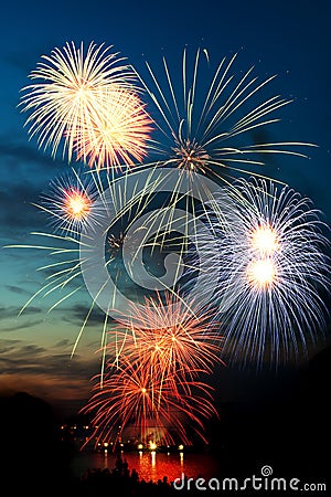 Brightly colorful fireworks in the night sky Stock Photo