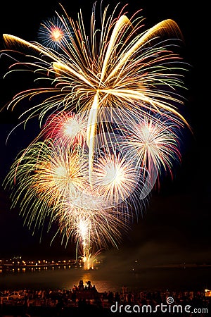 Brightly colorful fireworks in the night sky Stock Photo