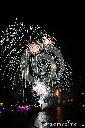 Brightly colorful fireworks in the night sky Stock Photo